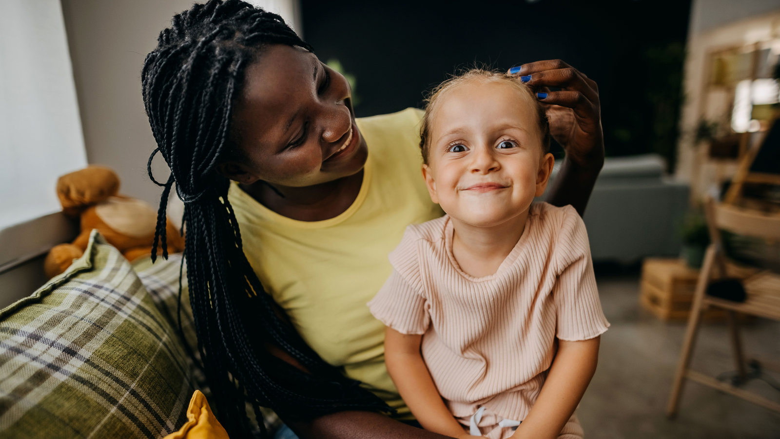 Adult with young child sat on their lap