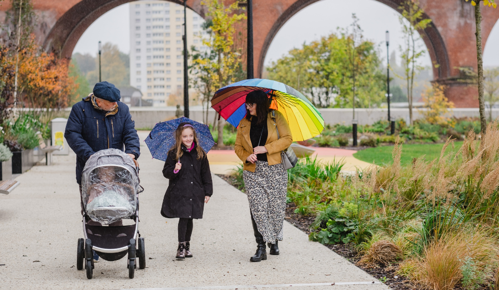 foster parents walking with their children 